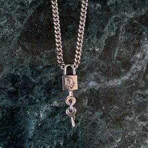 Christian Dior Silver Lock + Key Necklace